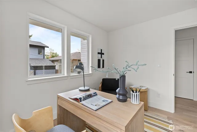 a view of a workspace with furniture