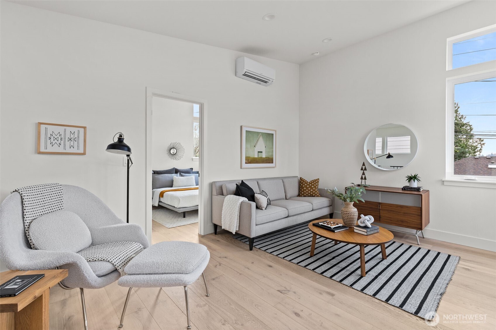 8407 42nd Avenue Southwest Seattle, WA 98136 - Photo 6 of 34 a living room with furniture a rug and a window