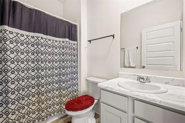 a bathroom with a sink and a toilet