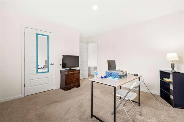 a workspace with furniture and window