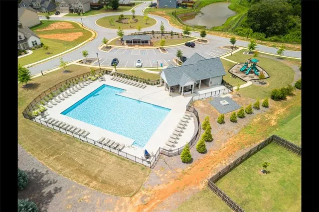 a view of a swimming pool with a patio