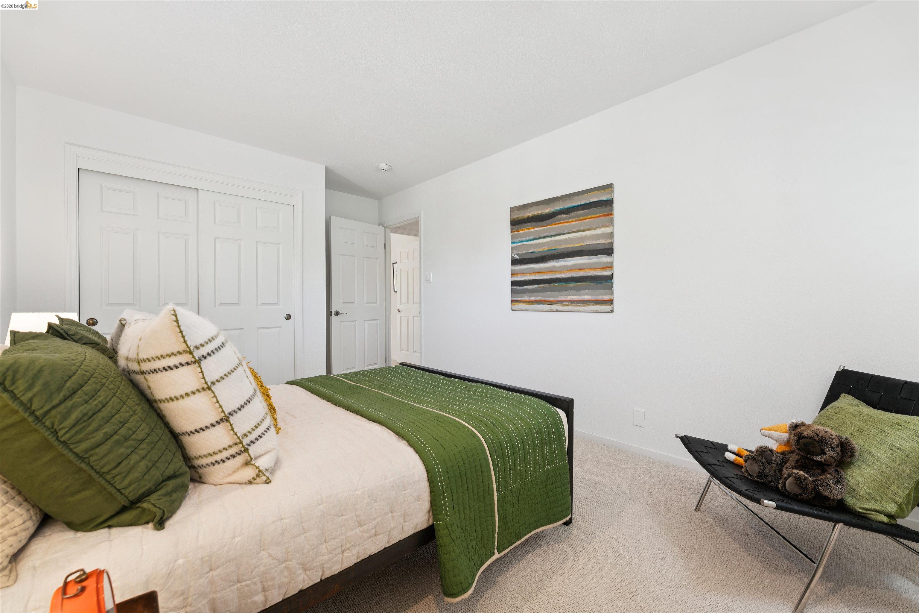 7 Jo Lin Court El Sobrante, CA 94803 - Photo 65 of 99 Bright room featuring neutral wall tones and plush carpet flooring