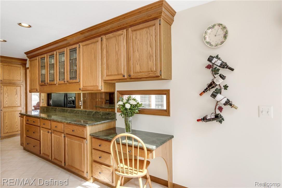 4140 Ridge Side Drive Rochester, MI 48306 - Photo 15 of 42 Featuring a built in desk area.