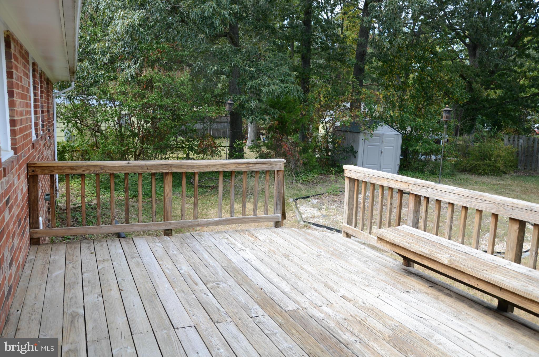 3206 Dalewood Road Fort Washington, MD 20744 - Photo 14 of 18 a view of backyard with a deck and wooden floor
