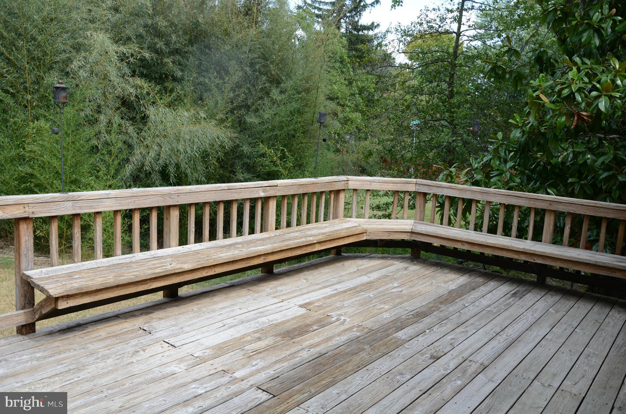 3206 Dalewood Road Fort Washington, MD 20744 - Photo 15 of 18 a view of a wooden deck with a yard
