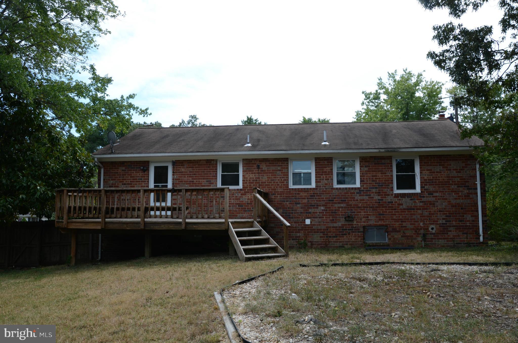 3206 Dalewood Road Fort Washington, MD 20744 - Photo 16 of 18 a front view of a house with yard