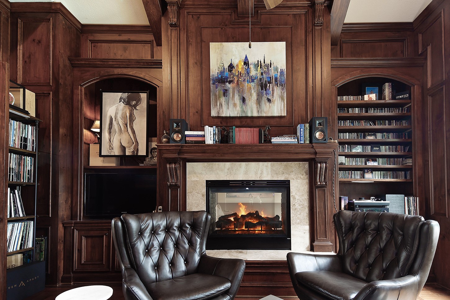 119 Angel Leaf Road The Woodlands, TX 77380 - Photo 24 of 50 a living room with furniture and a fireplace