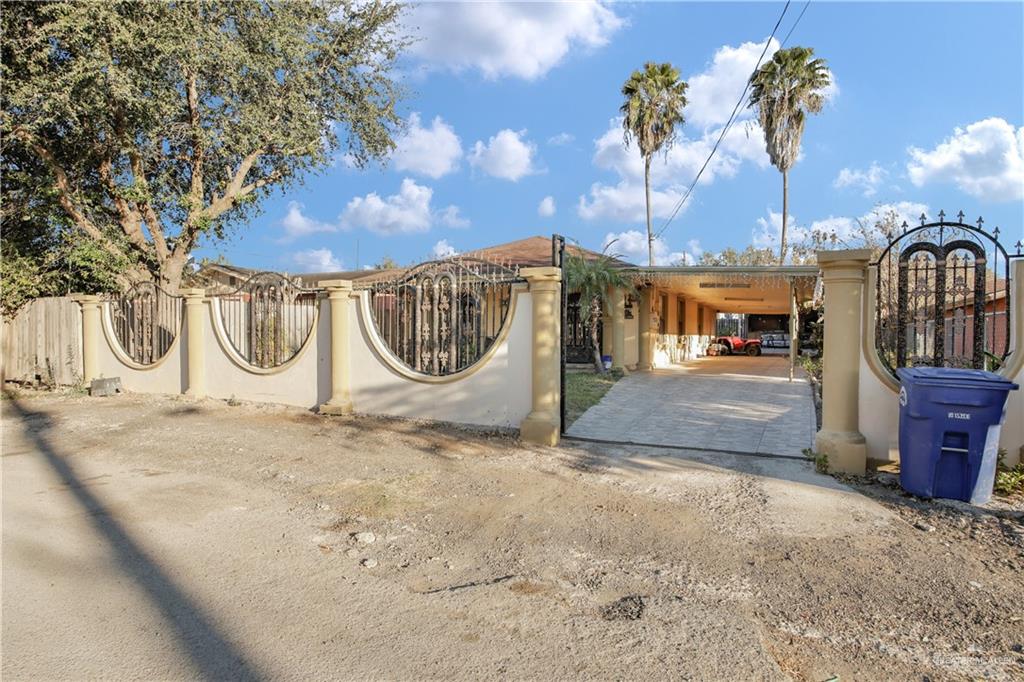 309 Domingo Navarez Street Rio Grande City, TX 78582 - Photo 3 of 14 View of gate