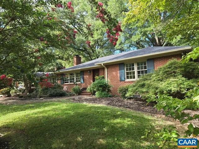 a backyard of a house with seating space