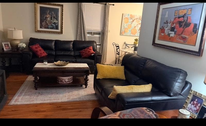 476 Jenson Road Memphis, TN 38109 - Photo 13 of 17 Living room featuring wood finished floors and cooling unit