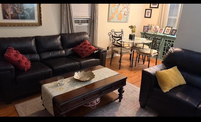 476 Jenson Road Memphis, TN 38109 - Photo 16 of 17 Living area featuring light wood-type flooring and cooling unit