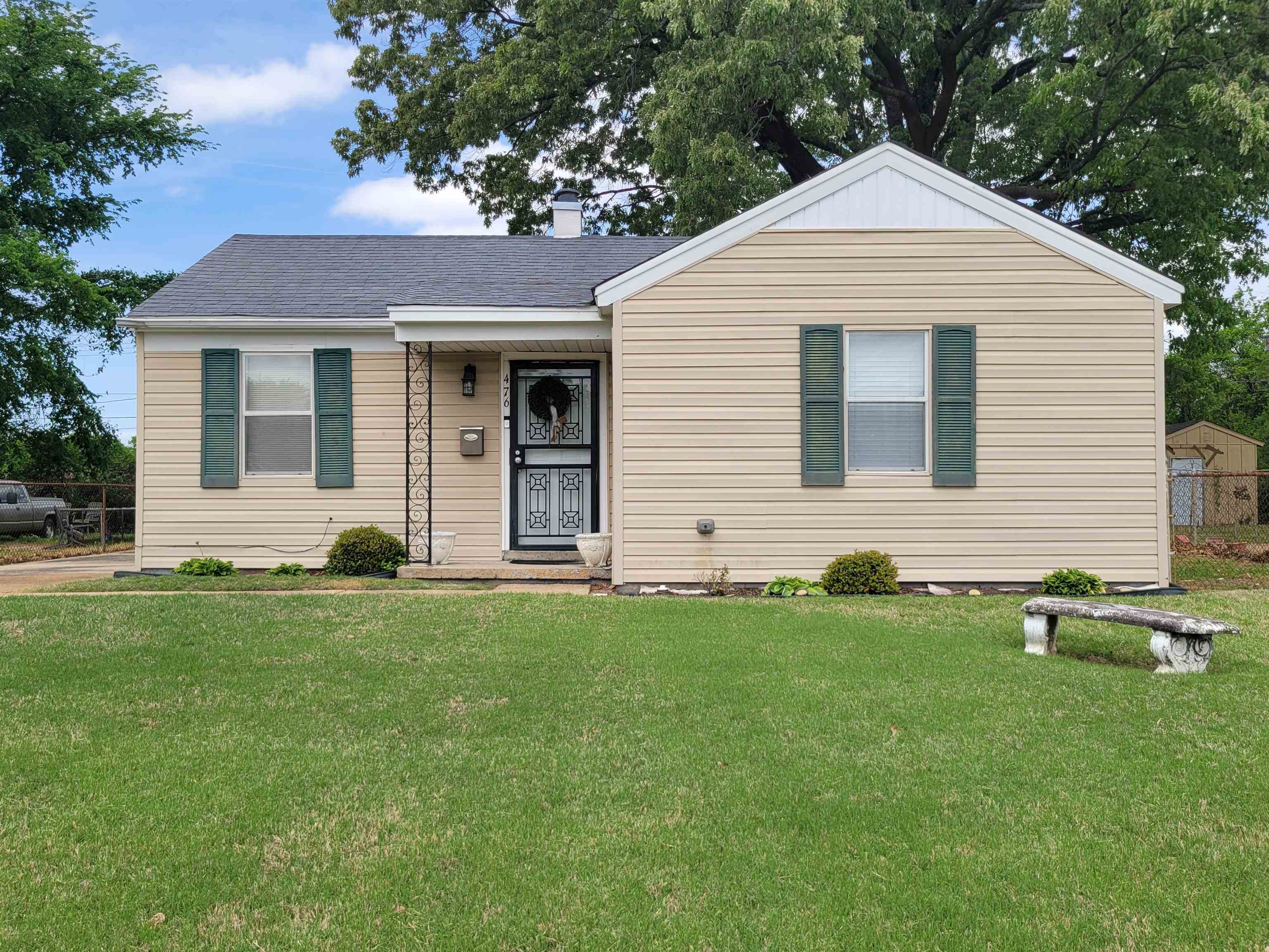 476 Jenson Road Memphis, TN 38109 - Photo 17 of 17 View of front facade featuring roof with shingles and a chimney