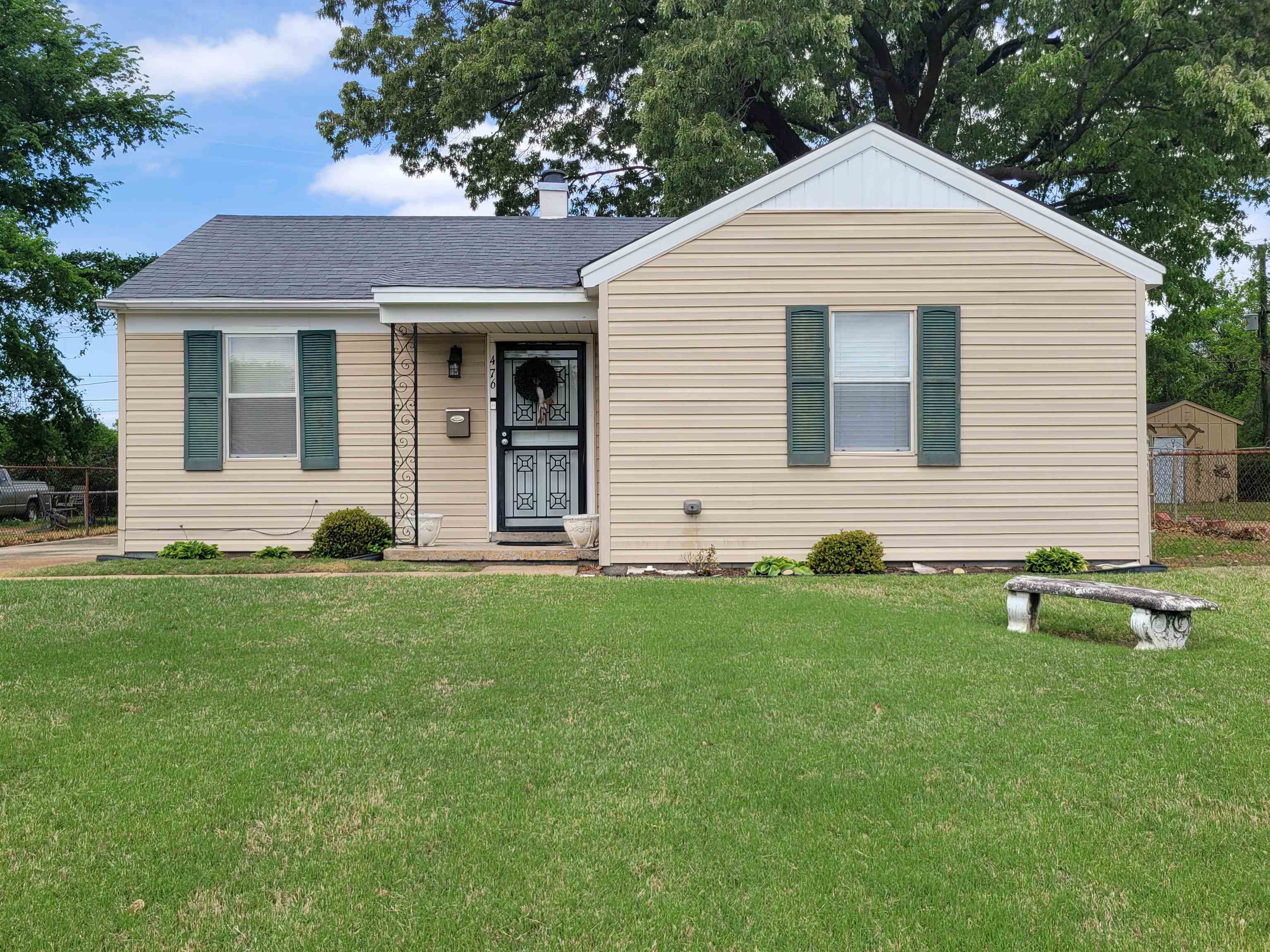 476 Jenson Road Memphis, TN 38109 - Photo 2 of 17 View of front of property with a shingled roof and a chimney