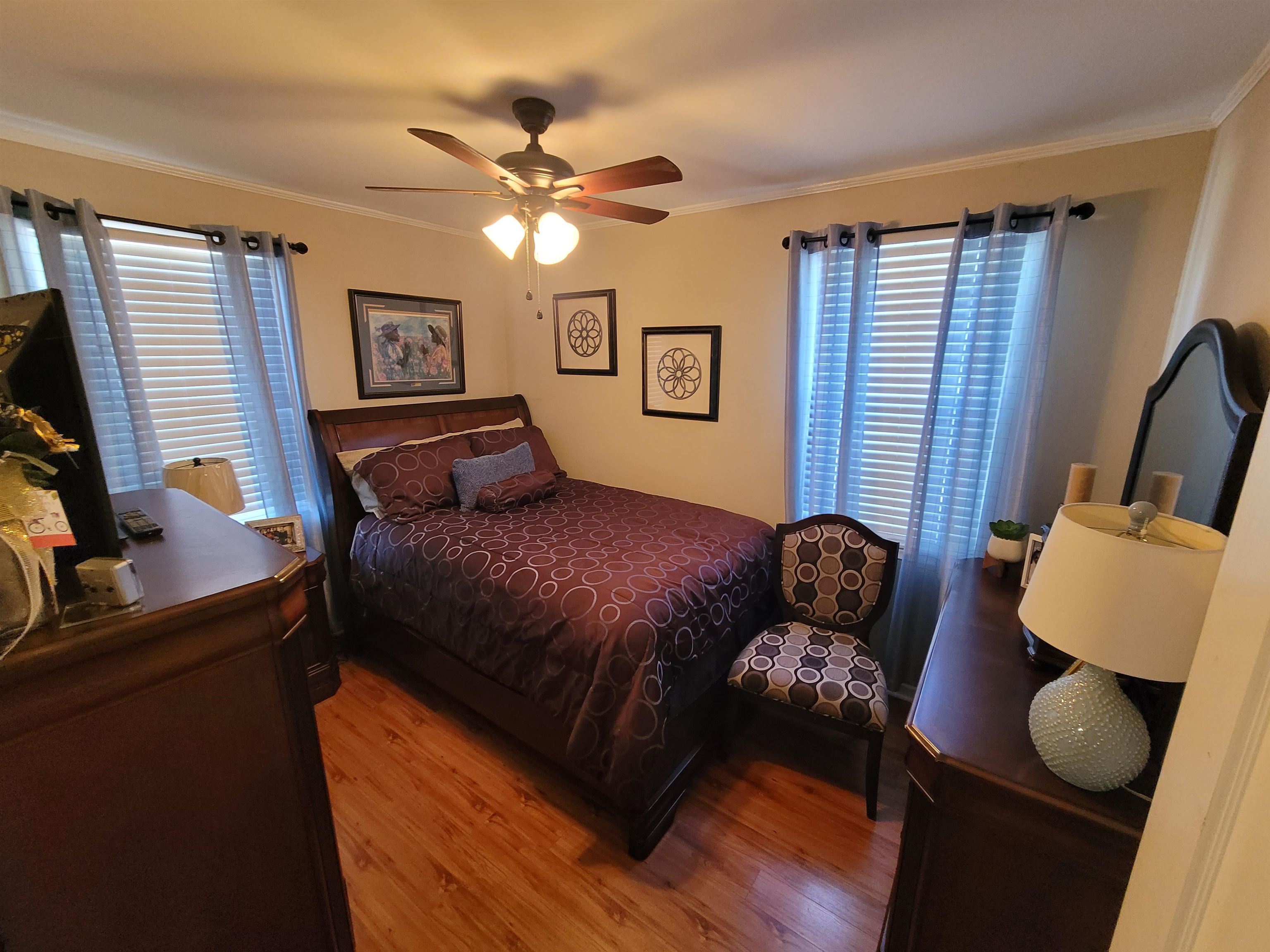 476 Jenson Road Memphis, TN 38109 - Photo 26 of 30 a bedroom with a bed window and couch