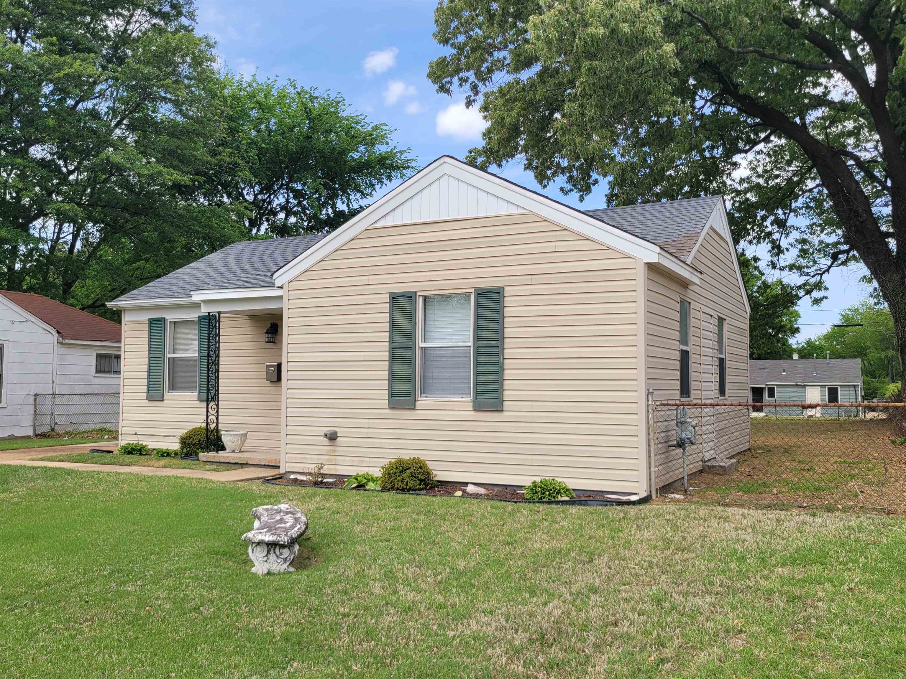 476 Jenson Road Memphis, TN 38109 - Photo 3 of 17 View of front facade featuring roof with shingles