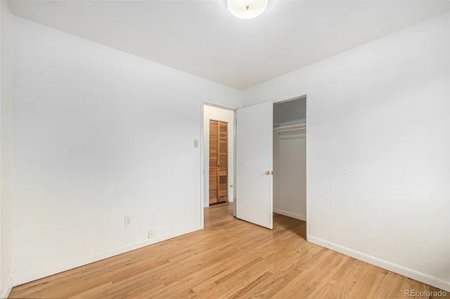a bathroom with a sink toilet and vanity