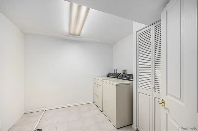 a view of a chair and table in the patio