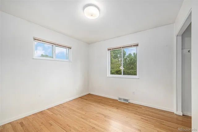 a bathroom with a shower and toilet