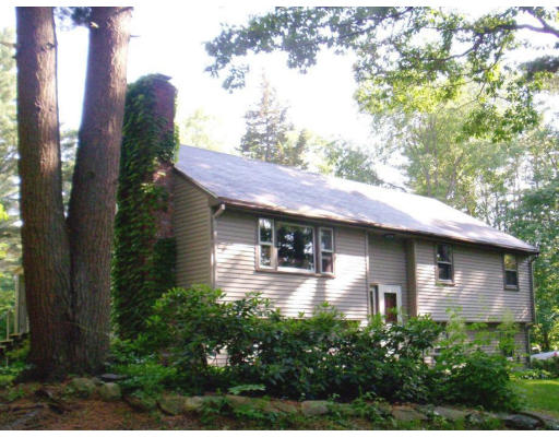9 Potter Road Douglas, MA 01516 - Photo 1 of 26 a front view of a house with garden