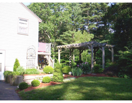9 Potter Road Douglas, MA 01516 - Photo 18 of 26 a view of backyard with plants and outdoor seating