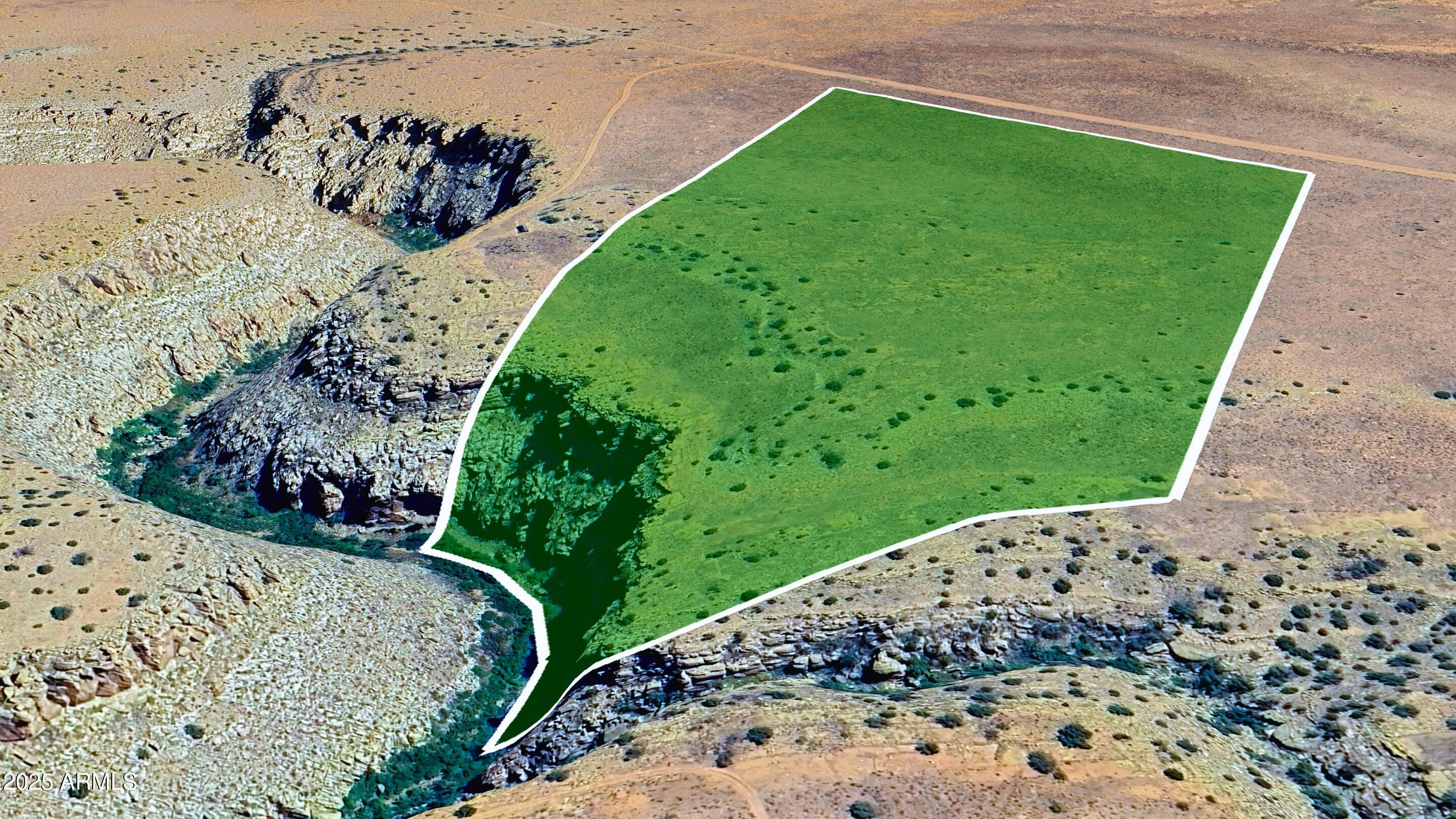 0 Unknown Road, Unit 666 Winslow, AZ 86047 - Photo 6 of 23 a view of a garden with a pathway