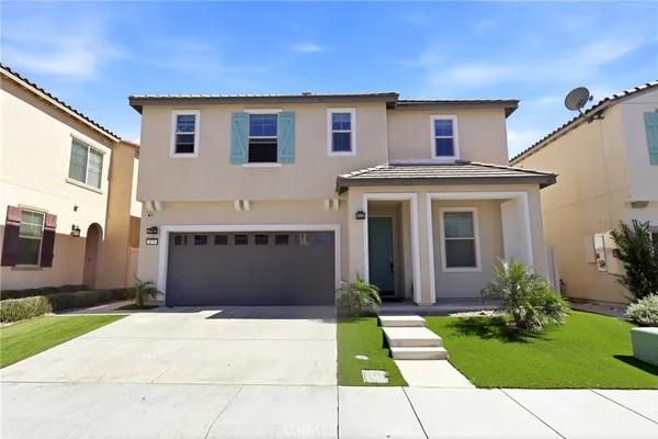 a front view of house with yard