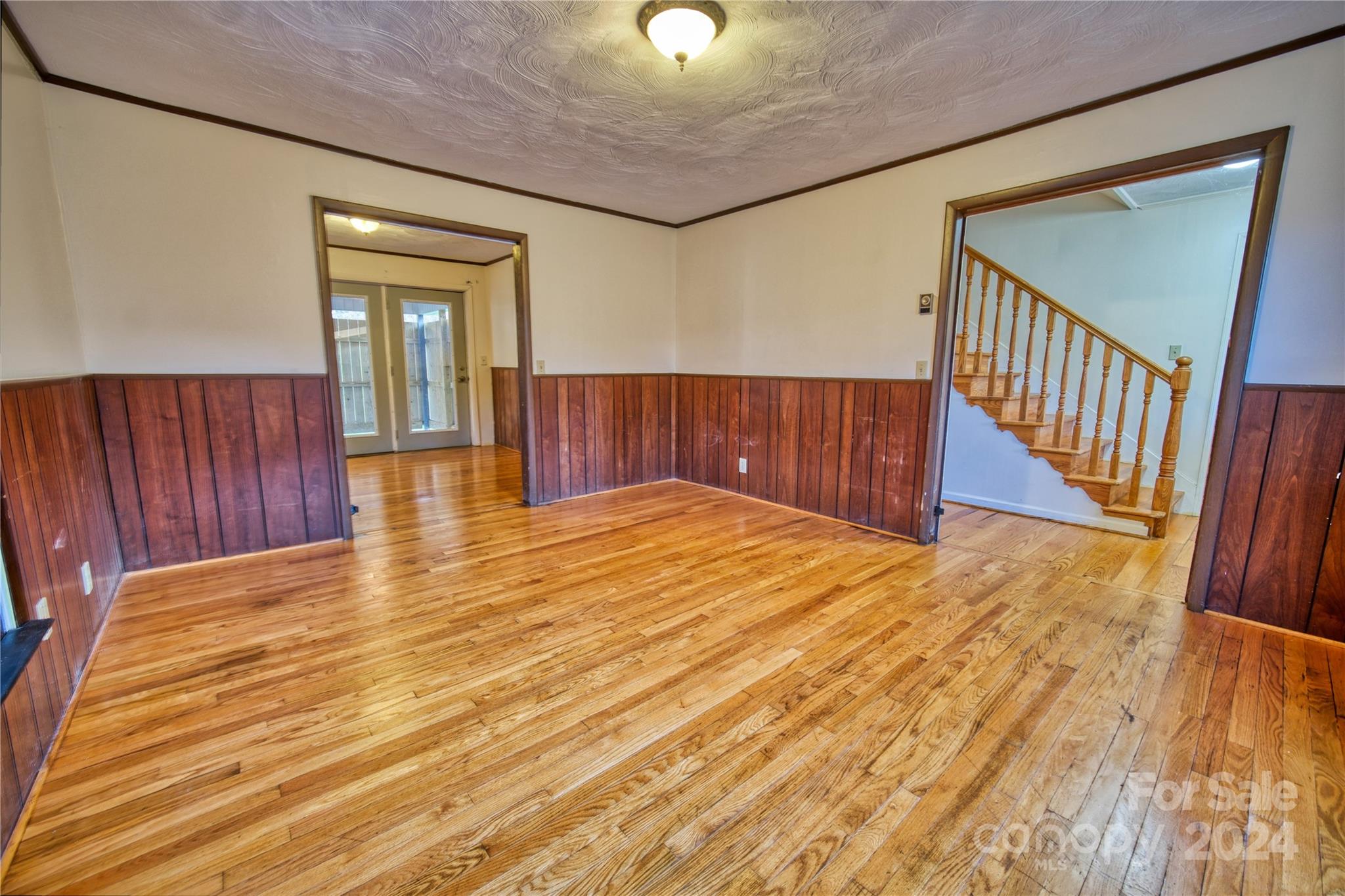 181 Colt Creek Road Lansing, NC 28643 - Photo 24 of 40 a view of an entryway with wooden floor