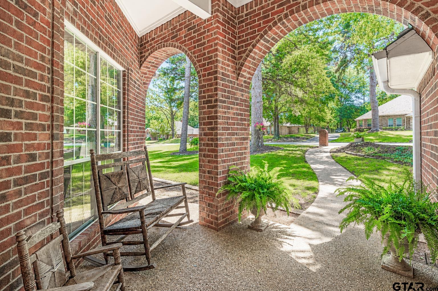 1388 Santa Fe Trail Tyler, TX 75703 - Photo 6 of 46 a house view with a garden space