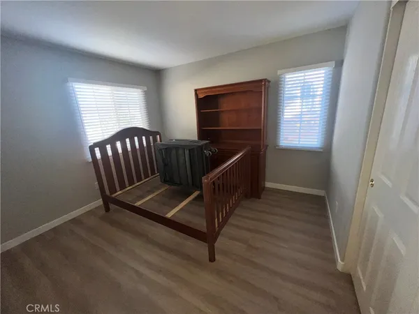 a view of a balcony with furniture