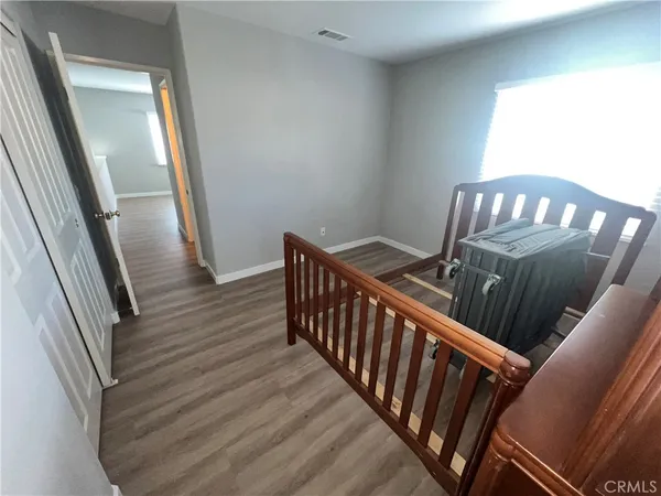 a backyard of a house with yard and outdoor seating