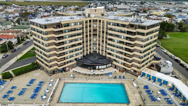 a picture of a building with a yard