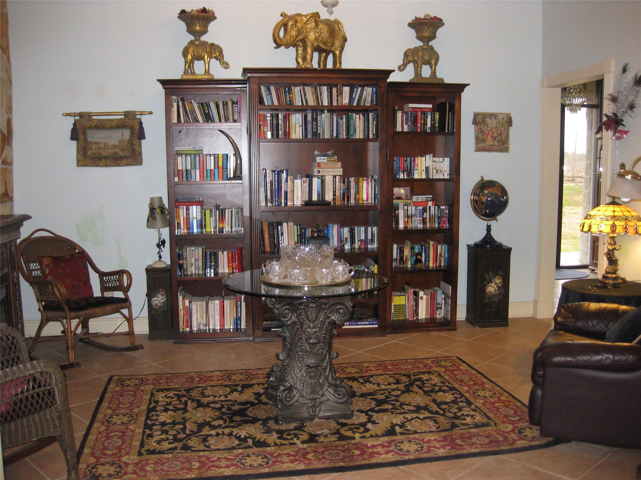 29315 Stockdick Road Katy, TX 77493 - Photo 13 of 50 a living room with fireplace furniture and books on a table