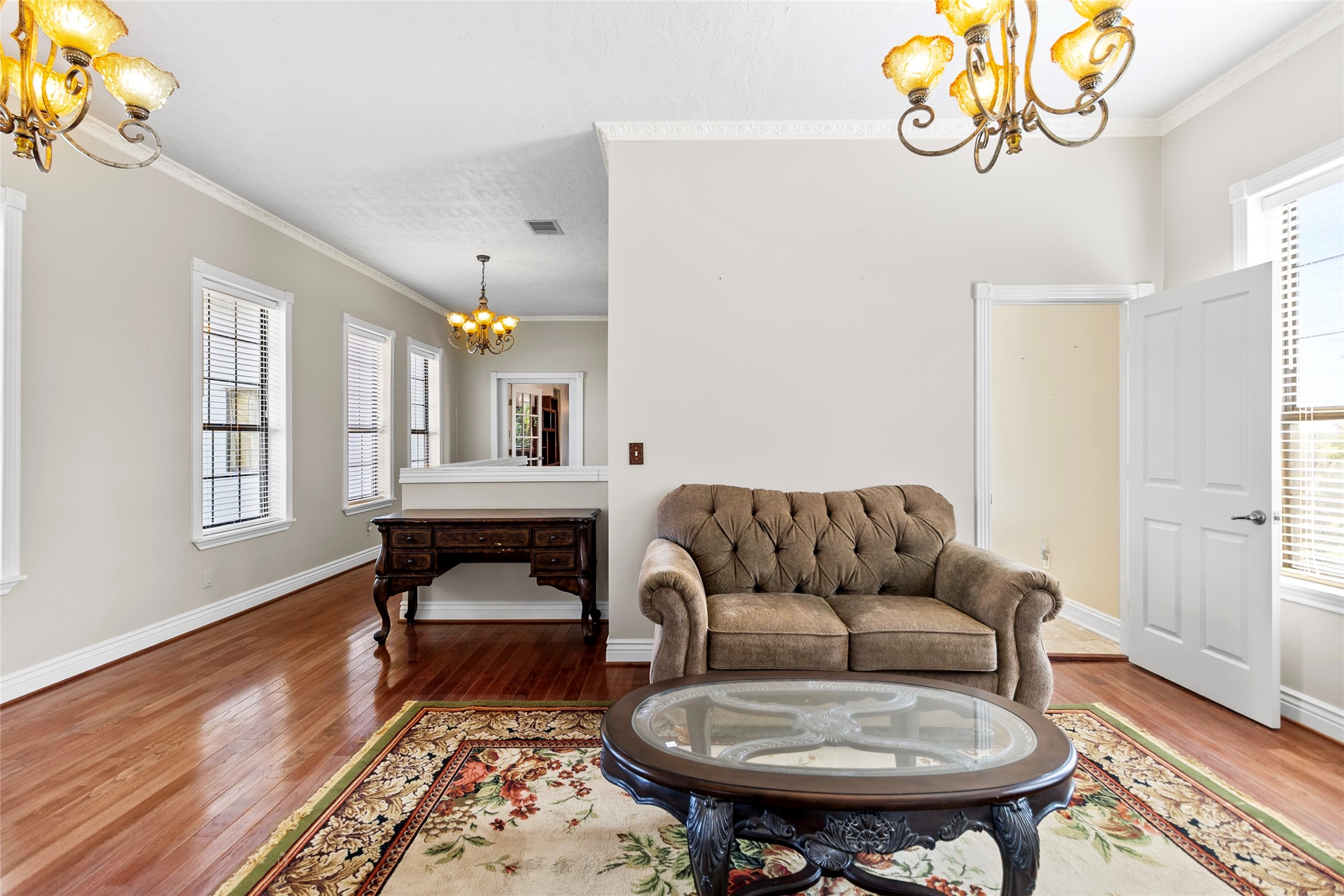29315 Stockdick Road Katy, TX 77493 - Photo 25 of 50 a living room with furniture and a wooden floor