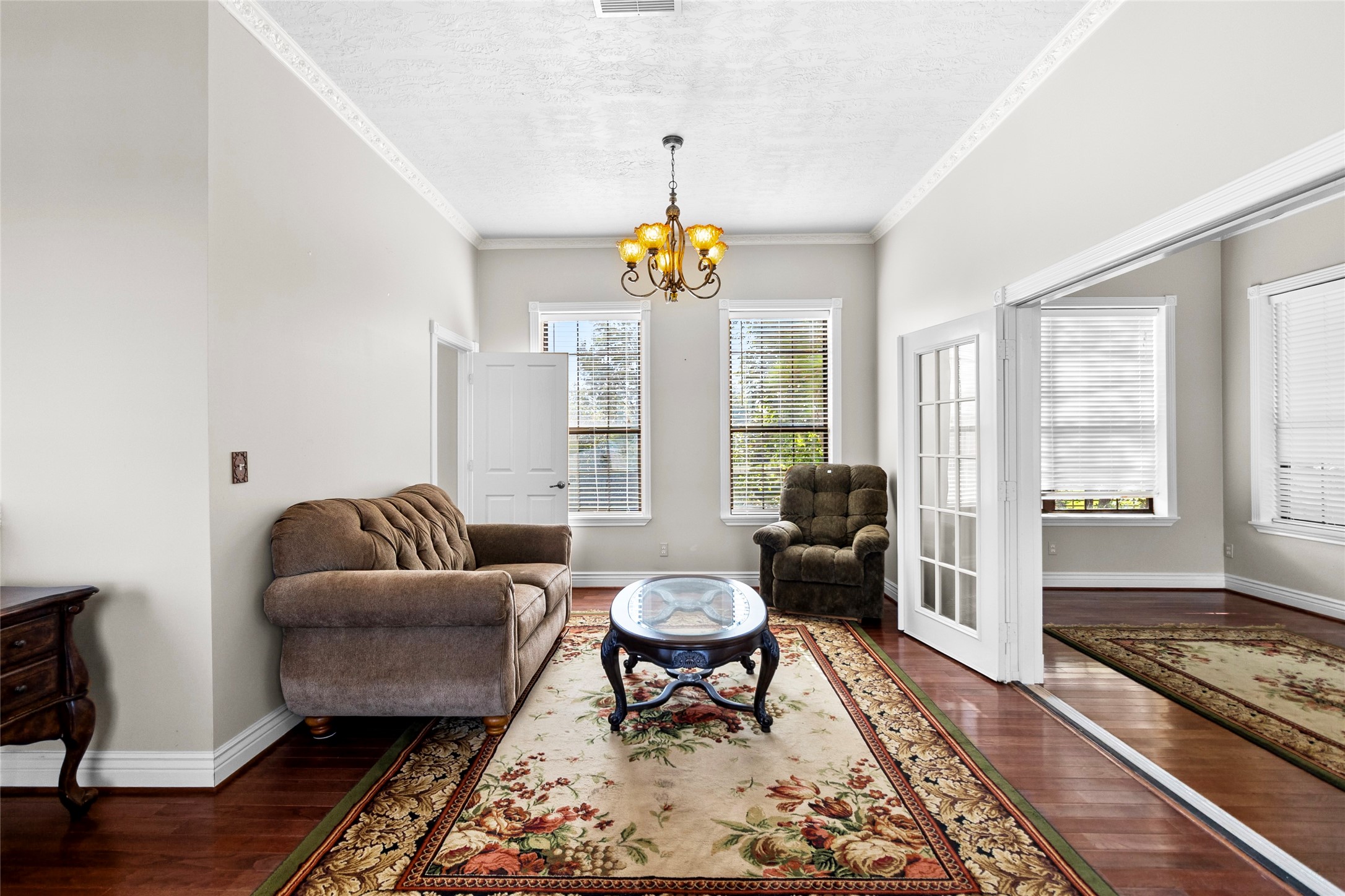 29315 Stockdick Road Katy, TX 77493 - Photo 26 of 50 a living room with furniture a dining table and a window