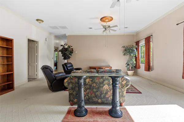 a bathroom with a tub a sink and a mirror