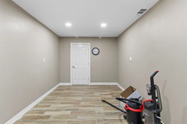 a bathroom with a shower a toilet and sink