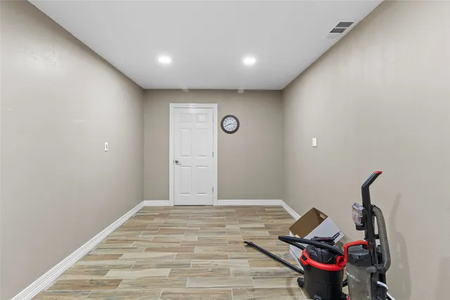 a bathroom with a shower a toilet and sink