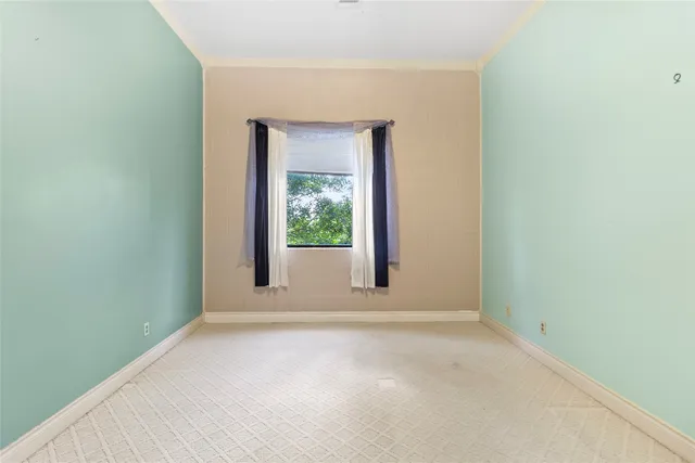 a bath room with a sink and a mirror