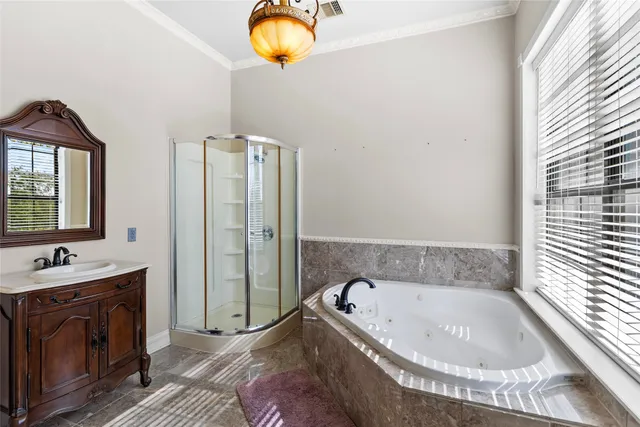 a picture of a bathroom with a shower