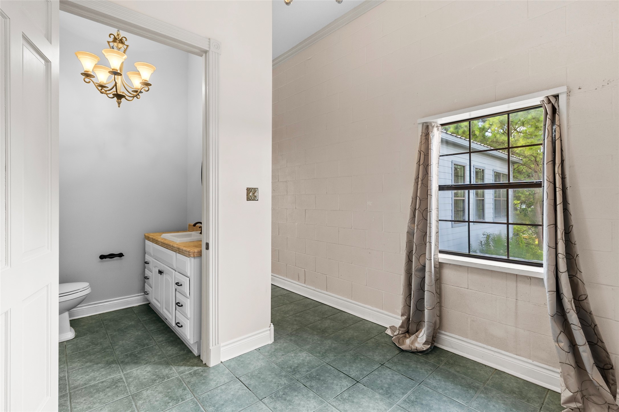 29315 Stockdick Road Katy, TX 77493 - Photo 43 of 50 a bathroom with a toilet sink and mirror
