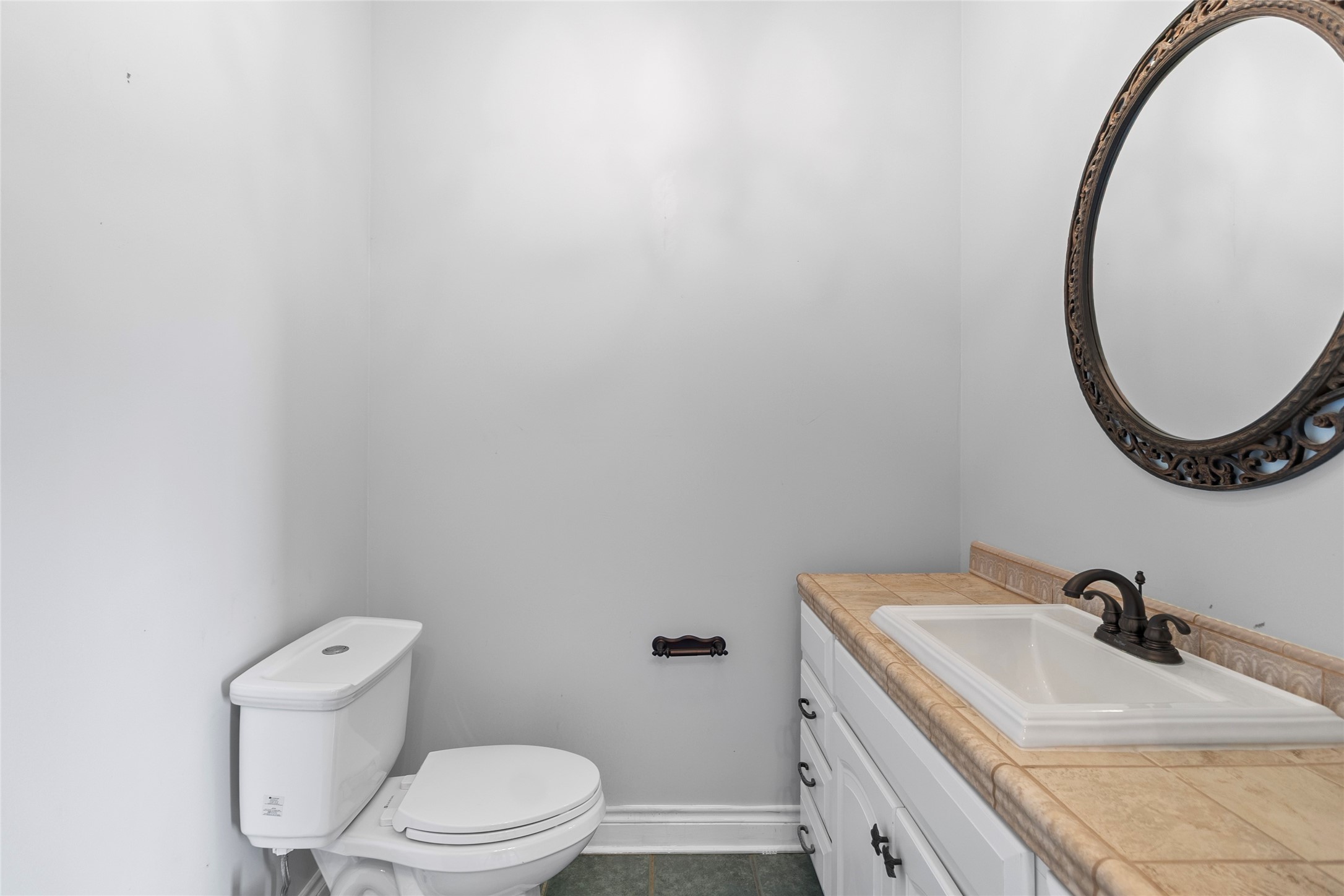 29315 Stockdick Road Katy, TX 77493 - Photo 44 of 50 a bathroom with a sink and a toilet