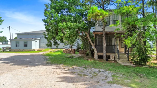 a view of a house with a swimming pool