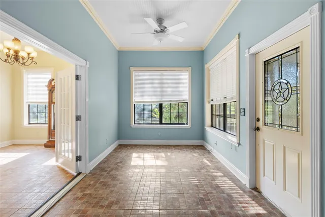 a view of hallway with windows