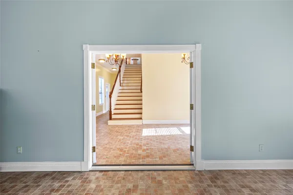 a view of an empty room and window