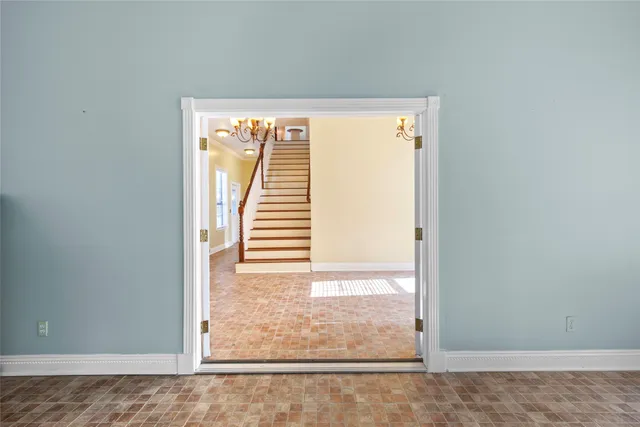 a view of an empty room and window