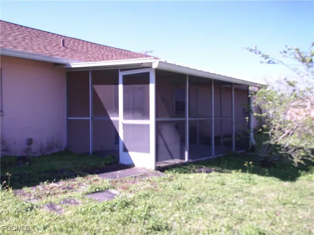 a view of backyard with potted plants