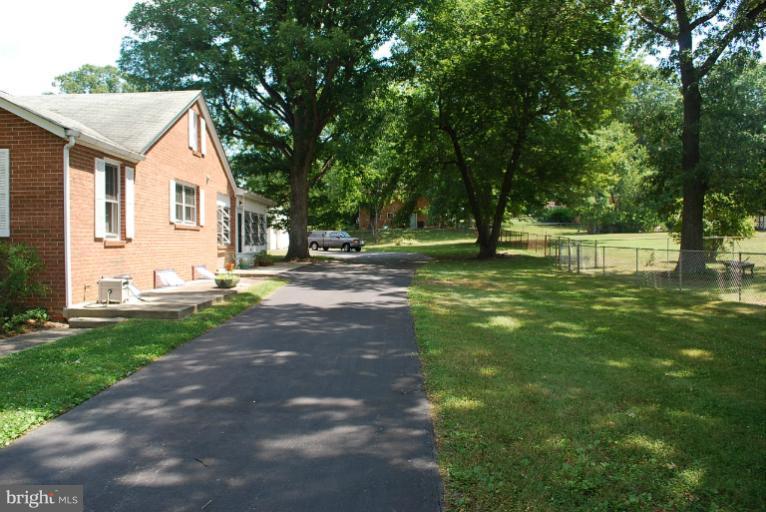 8710 Dangerfield Road Clinton, MD 20735 - Photo 9 of 30 Asphalt Driveway Leading to Rear