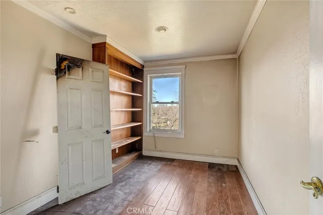 a room with a bed and a window