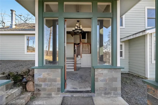 a front view of a house with a glass door