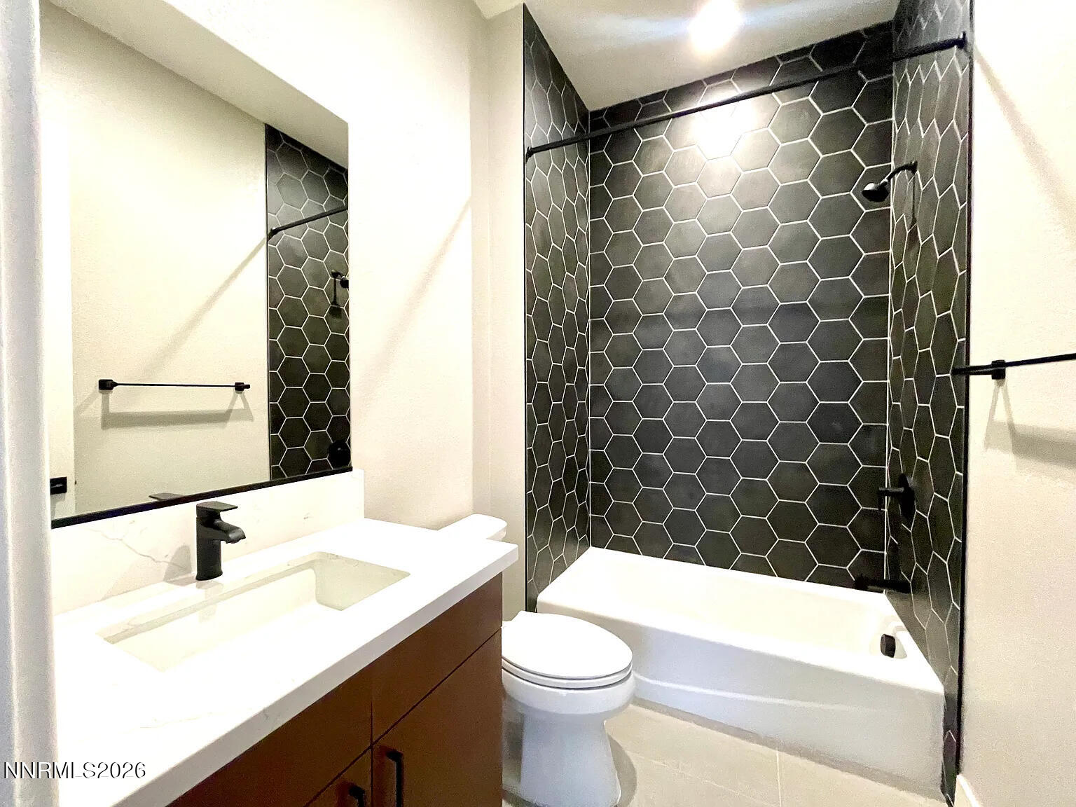 5418 Side Saddle Trail Reno, NV 89511 - Photo 36 of 37 a bathroom with a sink a toilet and shower